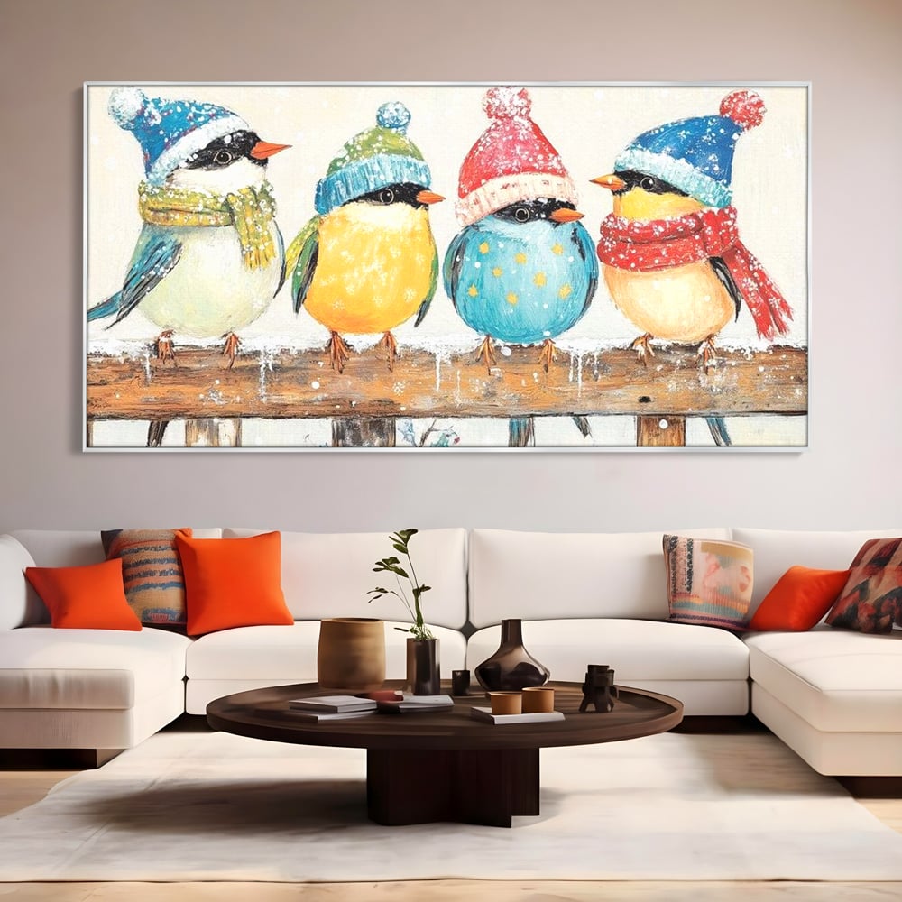 Tablou canvas cu tablou canvas cu vrabiute colorate in iarna, in rama de aluminiu argintiu, pe perete intr-un living
